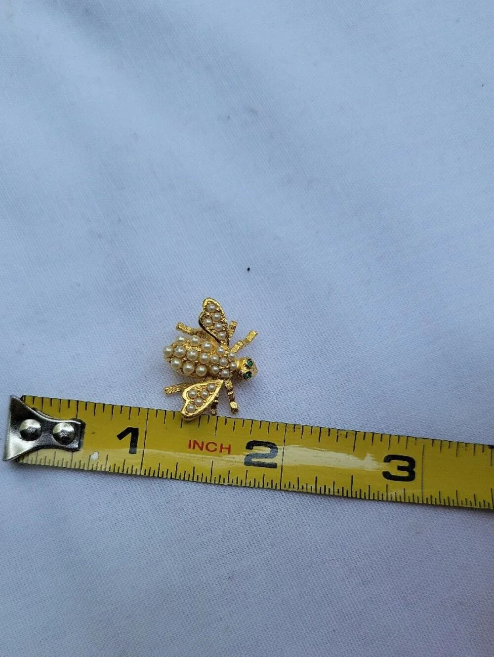 Vintage Joan Rivers Gold Bee Brooch with Pearl Accents and Green Eyes Classic